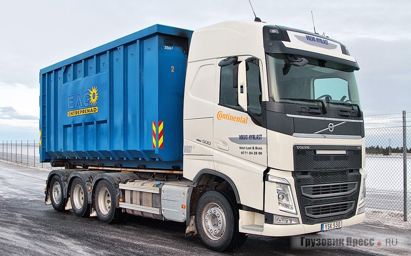 Volvo FH с крюковым захватом и кузовом для сбора строительных и бытовых отходов